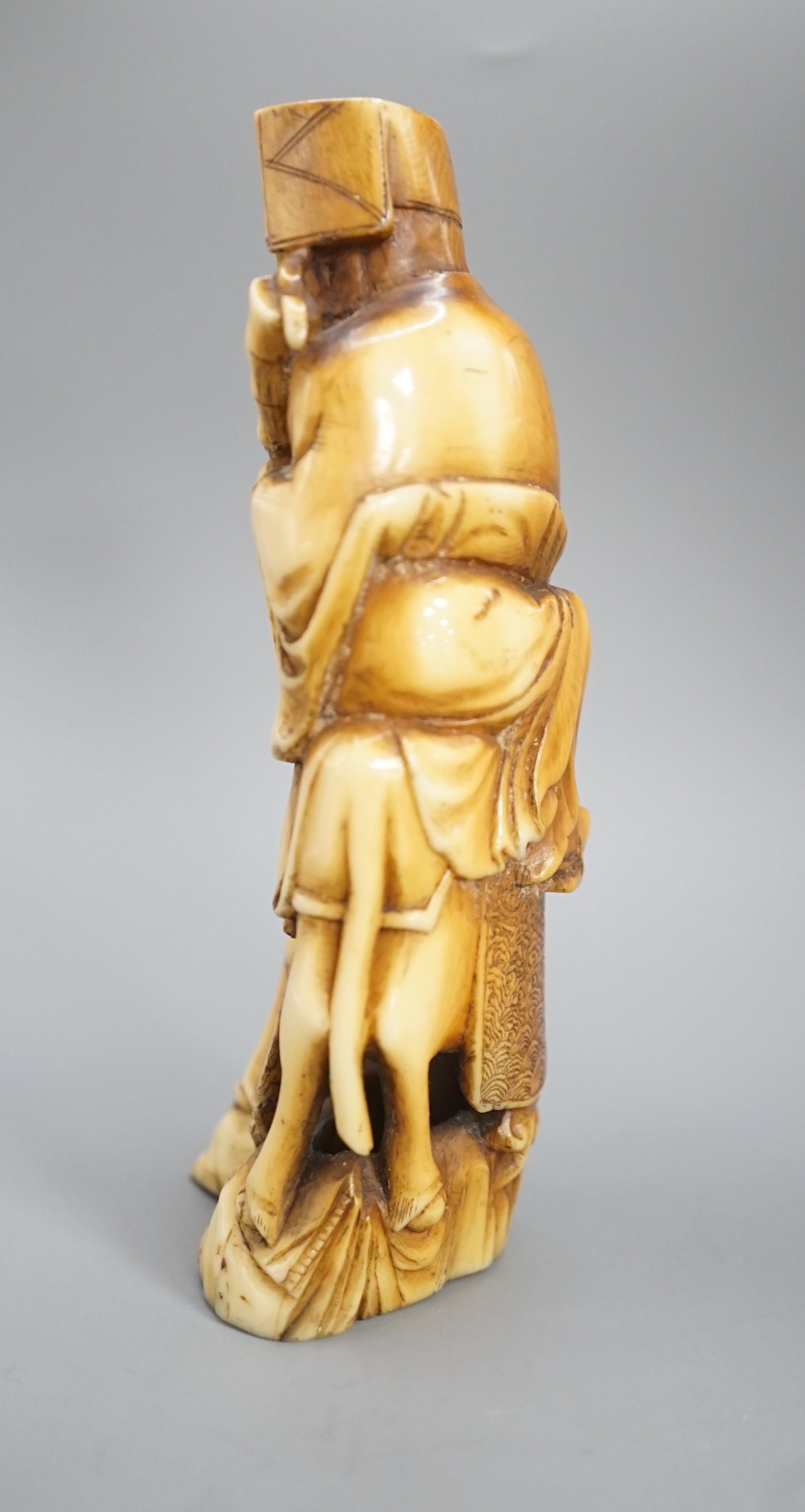 A Chinese hippopotamus ivory group of Zhang Guolao riding a horse, 19th century 14cm